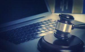a gavel on a computer symbolizing virtual litigation services